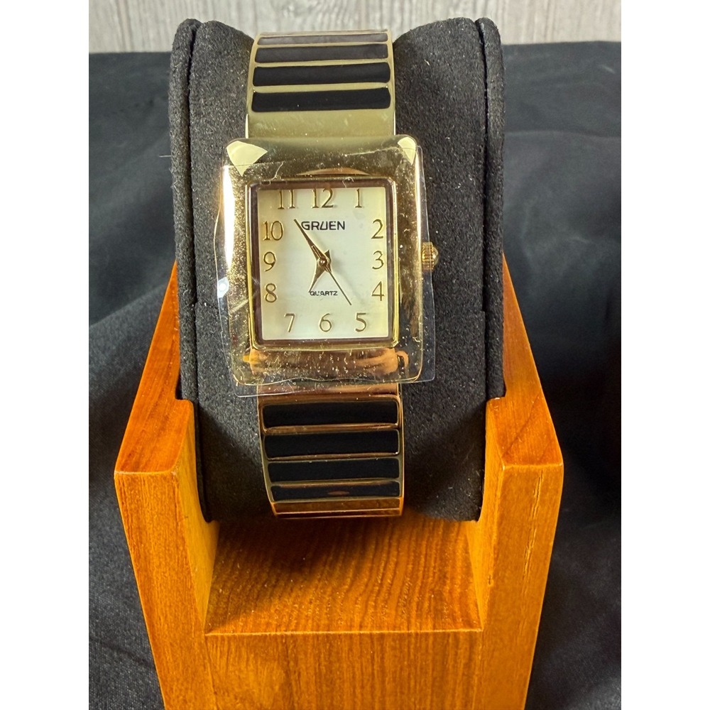 "The Confidence Watch" Gruen GP2032L Ladies Gold Tone Cuff Black Enamel Bracelet
